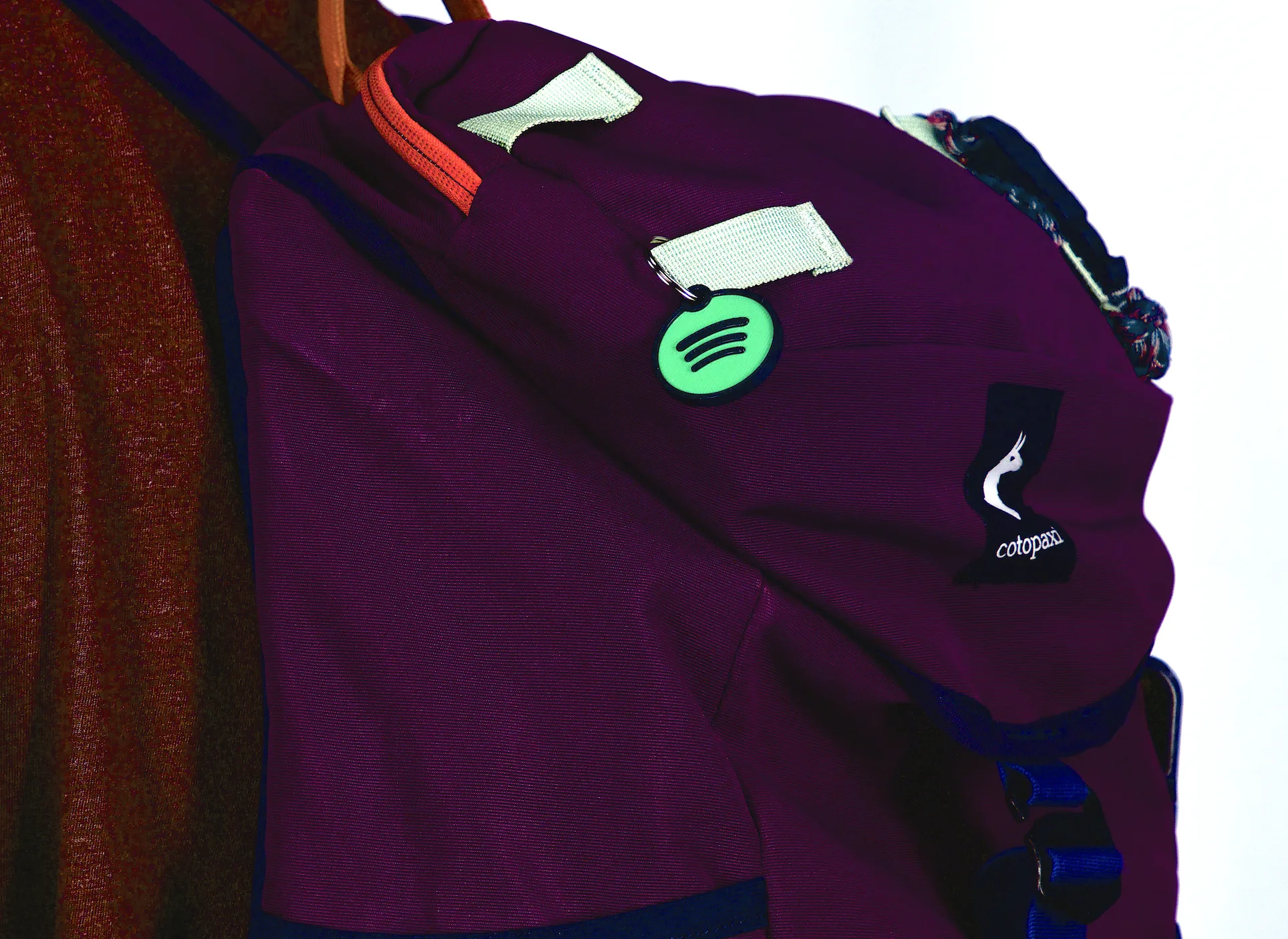 Custom NFC keychain attached to a backpack zipper